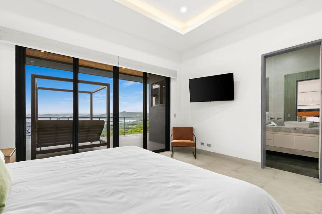 Bedroom 2 Smart TV and Balcony View